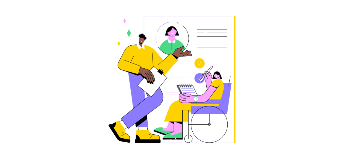 Une personne dans un fauteuil avec un ordinateur échange avec une personne debout dans un bureau